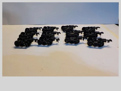 HO Lot Of 12 Used Plastic  Freight Car Trucks With Wheel Sets & Couplers - Image 1 of 3