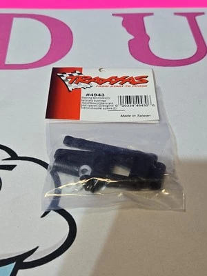 TRAXXAS 4943 Steering Bellcranks (2) Bushings (4) Post Spacers (2) Screws (2) - Image 1 of 4