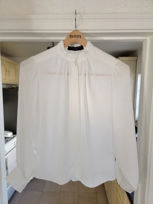 Uniforme Louis Vuitton blanco manga larga Foto 1 de 4