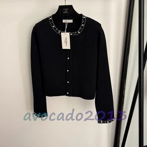 Cárdigan negro tejido manga larga cuello redondo botón perlas Sandro para mujer - Imagen 1 de 9