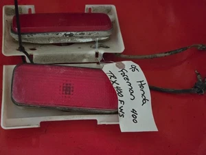 JUEGO LUCES TRASERAS IZQUIERDA DERECHA HONDA FOREMAN 400-450 1995-2004 - Imagen 1 de 6