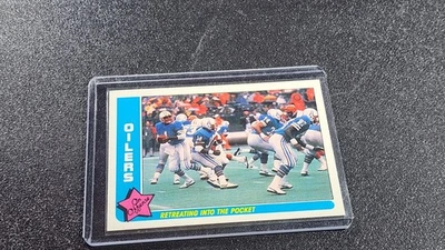 1985 Fleer Team Action #28 Retreating into the Pocket FOOTBALL Houston Oilers - Image 1 of 2