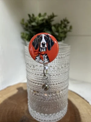 Carrete porta insignia nombre identificación retráctil naranja y blanco ahumado Coonhound University Foto 1 de 2