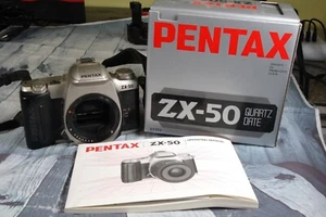 Pentax ZX-50 fotocamera reflex pellicola 35 mm PER RICAMBI - Foto 1 di 6
