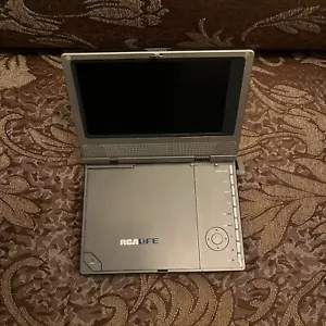 RCA DRC600N Portable DVD Player with 7" LCD Display - Picture 1 of 3