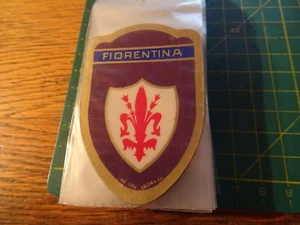 TOPPA PATCH  IN materiale plastico d epoca calcio fiorentina scritta blu - Imagen 1 de 2