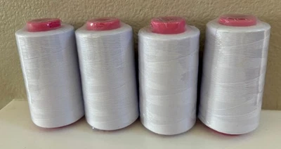 Lot of 4 Big Spools White Serger Sewing Thread 6000 YDS/Cone T27 S/2 - Image 1 of 2