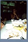 FOUND COLOR PHOTO Y+0401 PRETTY WOMAN SITTING AT TABLE SMILING