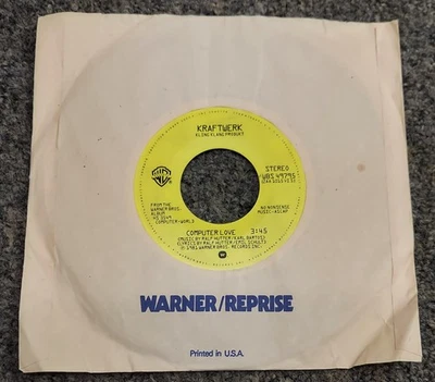 KRAFTWERK COMPUTER LOVE / NUMBERS 45 7" WARNER BROTHERS WBS 49795 VG++ YELLOW - Imagem 1 de 2