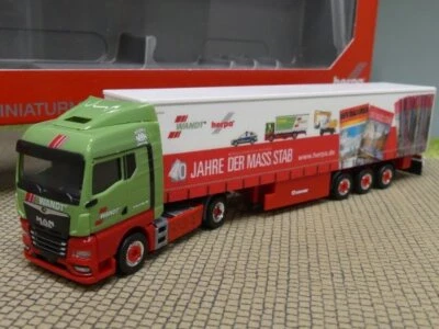 1/87 Herpa MAN TGX GM Gardinenplanen Sattelzug  40 Jahre Der Mass:stab 315555 - Bild 1 von 2
