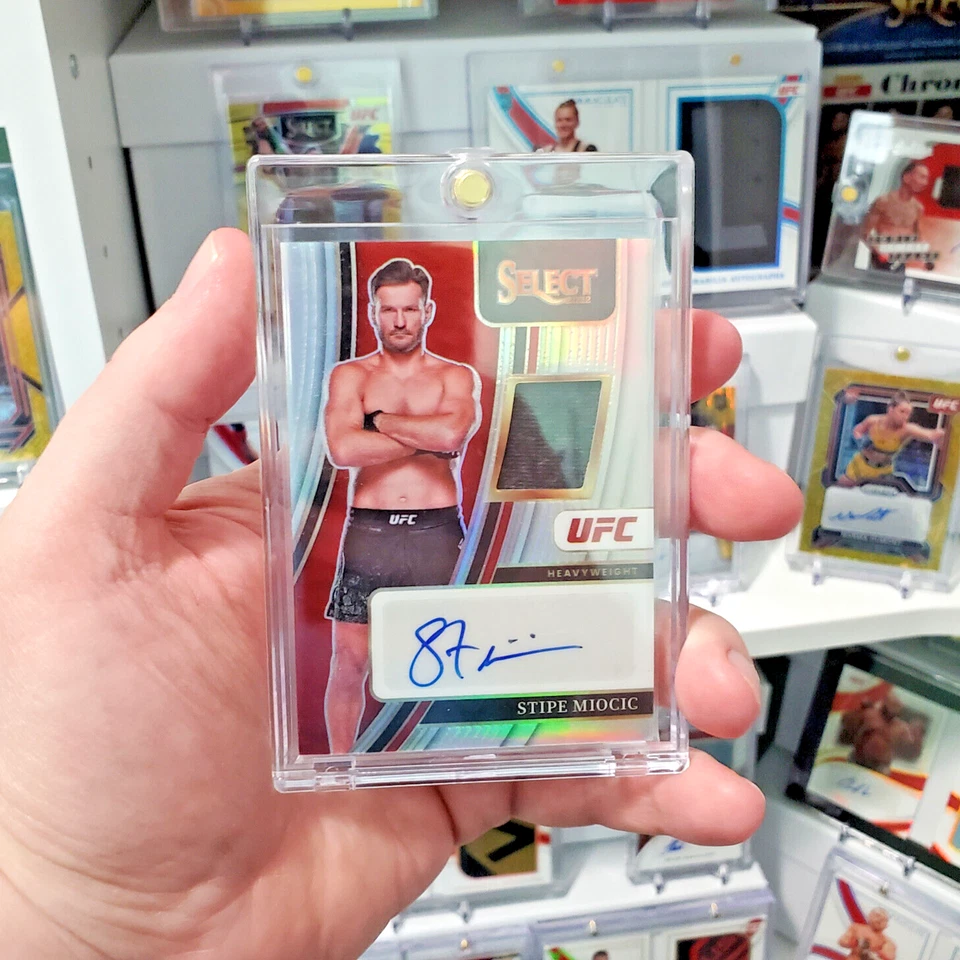 2022 Panini Select Stipe Miocic Autographed Memorabilia /199Auto - Image 1 of 4