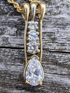 Authentic 14k Yellow Gold Pendant With Four Diamonds On A 10k Yellow Gold Chain. - Picture 1 of 11
