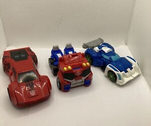 3 x Transformers Bundle Rescue Bots Blurr Purple, Sideswipe and Optimus Prime