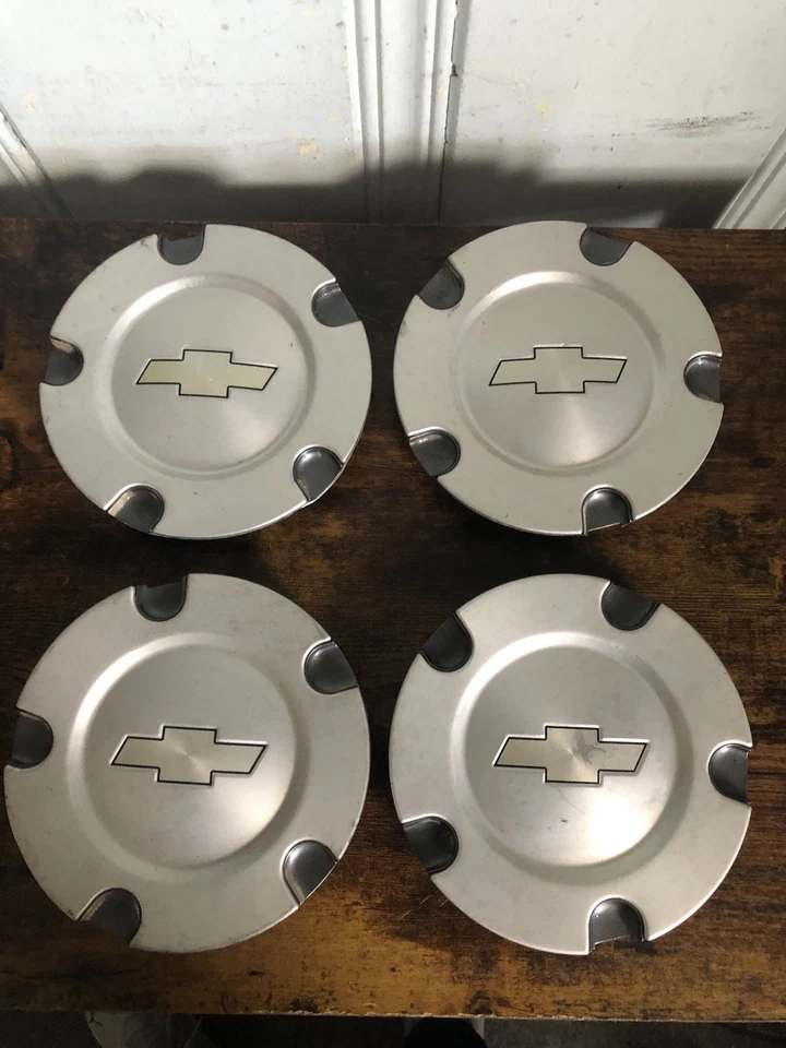 Juego de 4 cubiertas de tapacubos de tapacubos central Chevy Trailblazer 2004-2009 9595110 OEM Foto 1 de 4