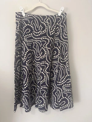 Falda midi de algodón estampada Anthropologie azul marino lunares remolino talla M Foto 1 de 4