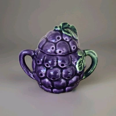 Azúcarero de cerámica púrpura con forma de uvas con hojas verdes Foto 1 de 3