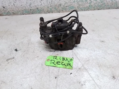 Mercedes Benz G550 2010 pasajero lado derecho pinza de freno trasera fabricante de equipos originales con soporte Foto 1 de 4