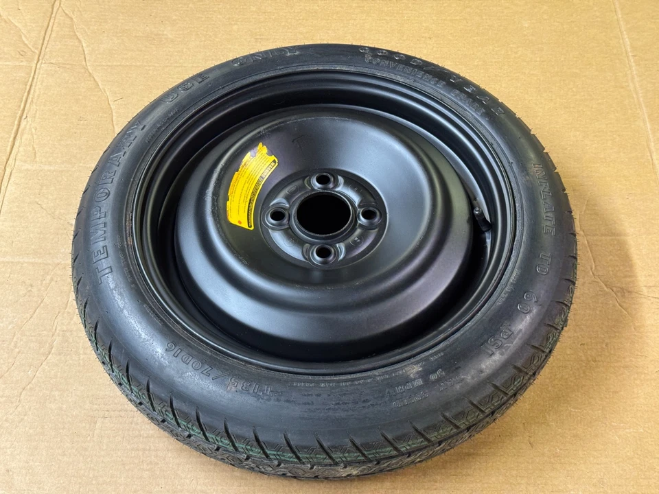 Neumático de repuesto Ford Mustang 87-93 comodidad de fábrica Goodyear 4 orejetas OEM T125/70D16 Foto 1 de 4