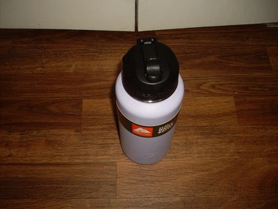 Botella de agua de paja abatible de acero inoxidable Ozark Trail 32 oz, índigo nueva Foto 1 de 4