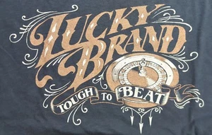 Neu mit Etikett Lucky Brand S/S schwarzes grafisches T-Shirt Roulette Größe wählbar L2002 - Bild 1 von 2