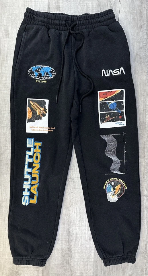Pantalones deportivos NASA lanzadera lanzadera negro logotipo bordado niños talla S (25X26 real) Foto 1 de 4