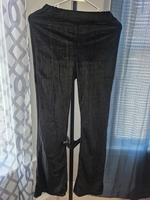Pantalones acanalados de terciopelo negro para mujer - cintura elástica. Foto 1 de 4