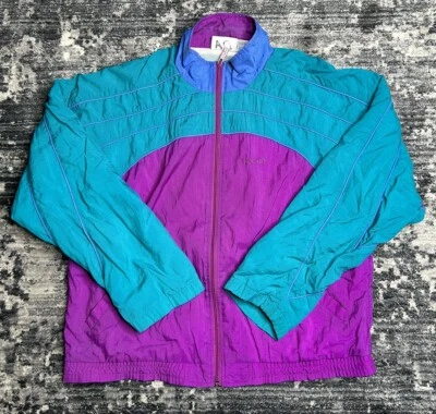 Chaqueta cortavientos Reebok vintage años 90 talla mediana para mujer púrpura nailon Foto 1 de 4