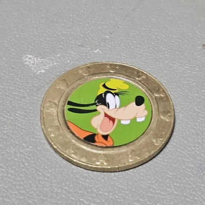 Disney Mickey Mouse Frankford Candy Metal Coin Goofy Green Background - Image 1 of 4