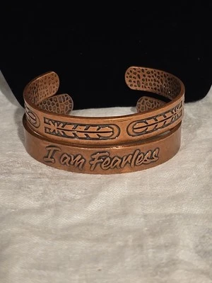 Pair Of Copper Cuff Bracelets I Am Fearless Feather Abstract Adjustable  - Image 1 of 4