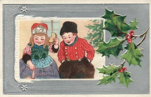 1907 Dutch Boy and Girl Eating and Playing Together On Christmas Morning - Picture 1 of 2