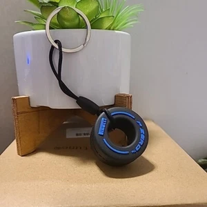 Unbranded Tire Swing Keychain Blue Trim/Black Tire Unisex NWOT Auto Office Fun - Picture 1 of 5