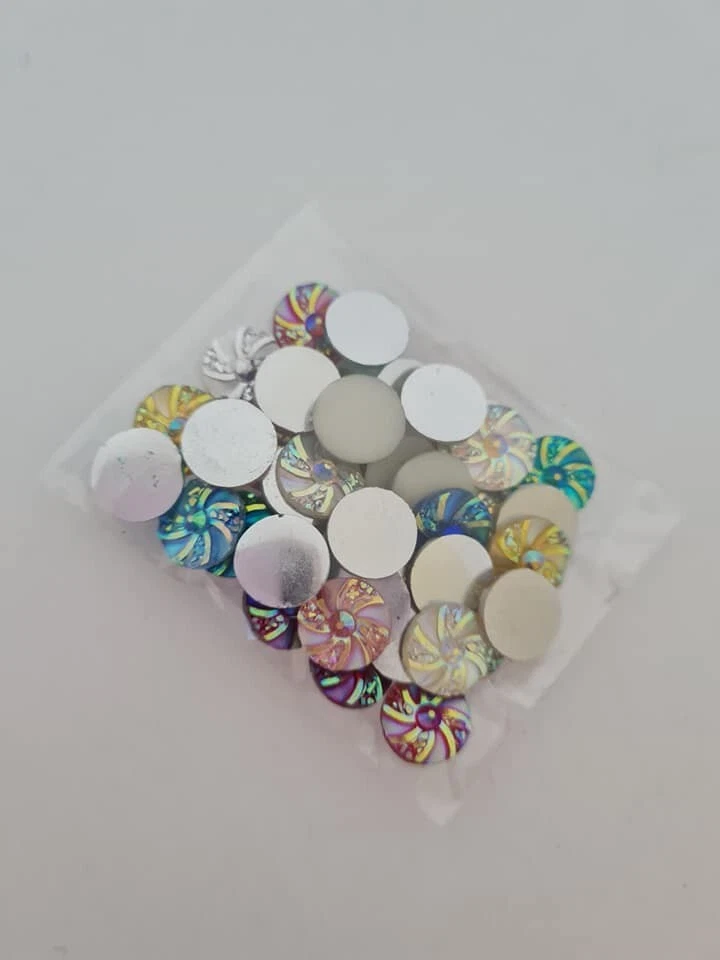 40 mixed 10 mm whirlwind round flat back rhinestone scrapbooking buttons - Image 1 of 1