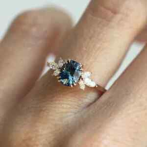 1.50 Ct Oval Cut Simulated Blue Sapphire Woman's Wedding Ring 14k Rose Gold Over