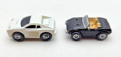 De colección 2 Micro Máquinas Funrise Blanco Ferrari Testarossa y Negro Ferrari Daytona Foto 1 de 4