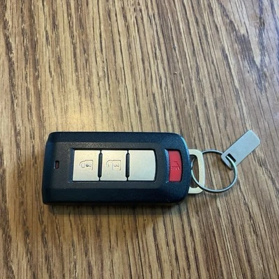 OEM 2010-2020 MITSUBISHI OUTLANDER MANDO A DISTANCIA LLAVE INTELIGENTE LLAVERO   Foto 1 de 4