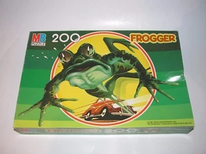 Rompecabezas Milton Bradley Frogger 1981 200 piezas nueva caja abollada - Imagen 1 de 4