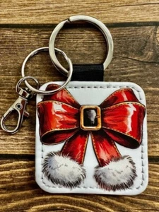 Quadratischer Schlüsselanhänger Rucksack Anhänger PU Leder Urlaub Santa Gürtel Kokette Schleife RTS - Bild 1 von 1