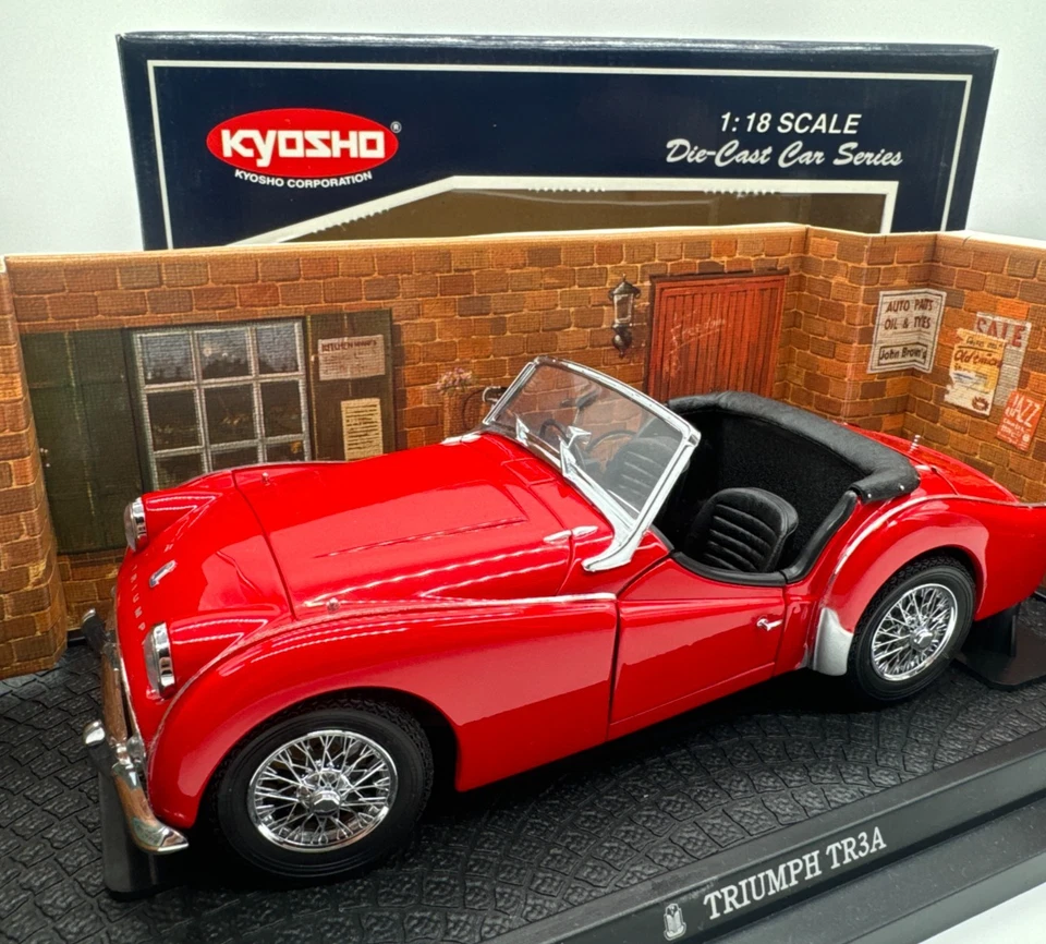 Voitures miniatures 1:18 Kyosho Kyosho Triumph TR3A 1958 rouge/noir avec boite d'origine - Photo 1/4