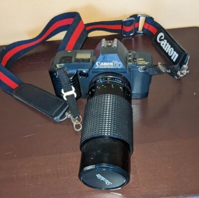 Cámara fotográfica vintage Canon T70 35 mm con Starblitz 80-200 mm MC zoom automático leer Foto 1 de 4