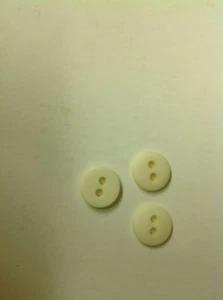 NEW 25 PC PKG.3/8 INCH NATURAL/OFF WHITE  DULL FINISH BUTTONS - Picture 1 of 2