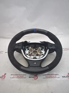 BMW Serie 5 6 7 2015 volante deportivo con palancas de cambios negro fabricante de equipos originales - Imagen 1 de 9