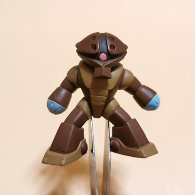 Mini boneco Bandai Gundam MS Mobile Suit Selection 8 MSM-04 ACGUY 2" marrom solto - Imagem 1 de 4