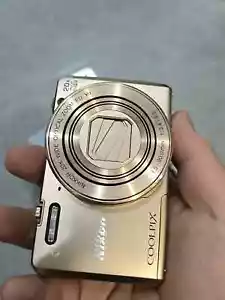 Nikon COOLPIX S7000 16.0MP 20X Optical Zoom Digital Camera Gold -English - Picture 1 of 3