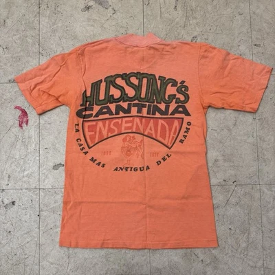Camiseta Hussongs Cantina Bolsillo Años 70 De Colección Naranja Desteñida México Bar Ensenada Playa Foto 1 de 4