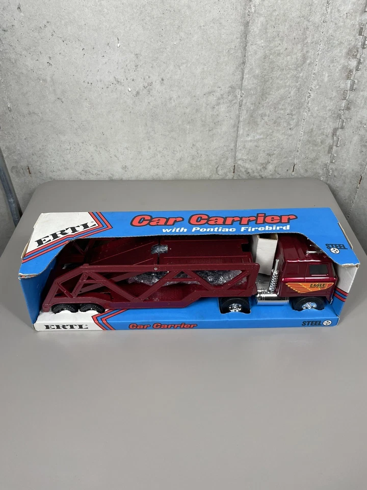 VTG New In Box! Ertl Pressed Steel Car Carrier With Pontiac Firebird - Image 1 of 4