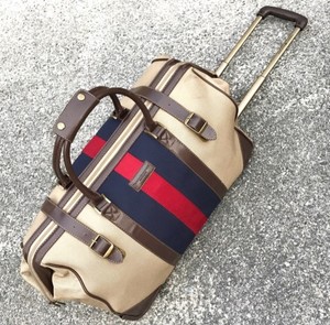 tommy hilfiger rolling duffel bag