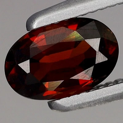 OVAL 0.56ct T.W 6x3.9mm Natural Reddish Orange Spessartite Garnet Namibia, Afric - Image 1 of 4
