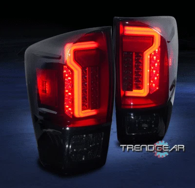 Luces de freno traseras LED negras/humo diestro+derecho para camioneta Toyota Tacoma 2016-2022 Foto 1 de 4