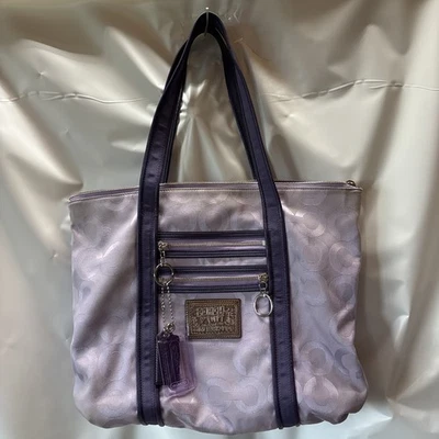 Bolso de hombro Coach Poppy Op Art Glam M0920-14530 precio de venta sugerido por el fabricante 389 USD Foto 1 de 4