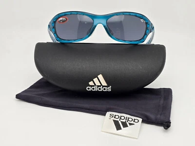 阿迪达斯 a980 00 6056 水蓝色镜框灰色 ClimaCool 镜头儿童太阳镜带盒 — 第 1/4 张图片